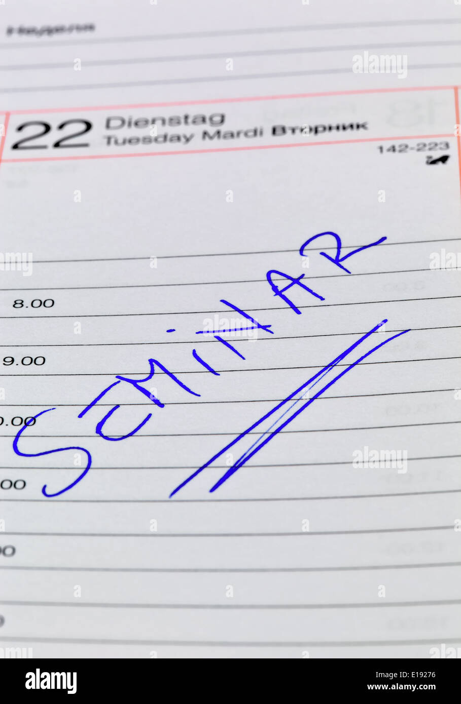 Ein Termin ist in einem Kalender eingetragen: Seminar Stock Photo