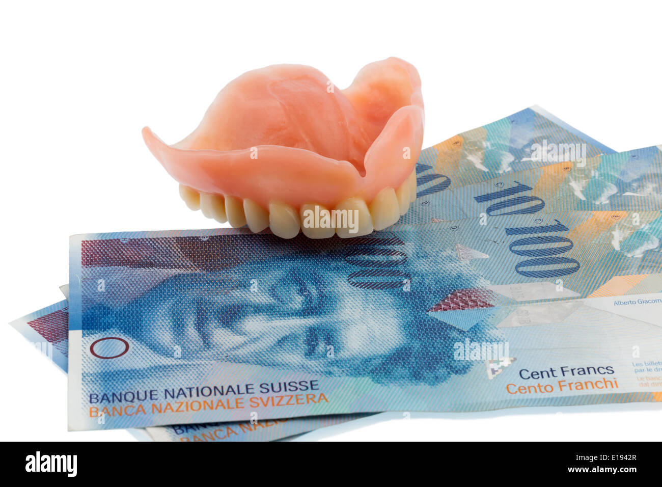 Gebiss und Schweizer Franken Symbolfoto f¸r Zahnersatz, Behandlungskosten und Zuzahlung Stock Photo