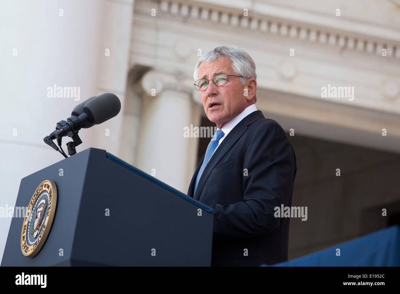 Arlington, Virginia. 26th May, 2014. United States Secretary of Defense Chuck Hagel delivers remarks during a Memorial Day event at Arlington National Cemetery, May 26, 2014 in Arlington, Virginia. President Obama returned to Washington Monday morning after a surprise visit to Afghanistan to visit U.S. troops at Bagram Air Field. Credit: Drew Angerer/Pool via CNP/dpa/Alamy Live News Stock Photo