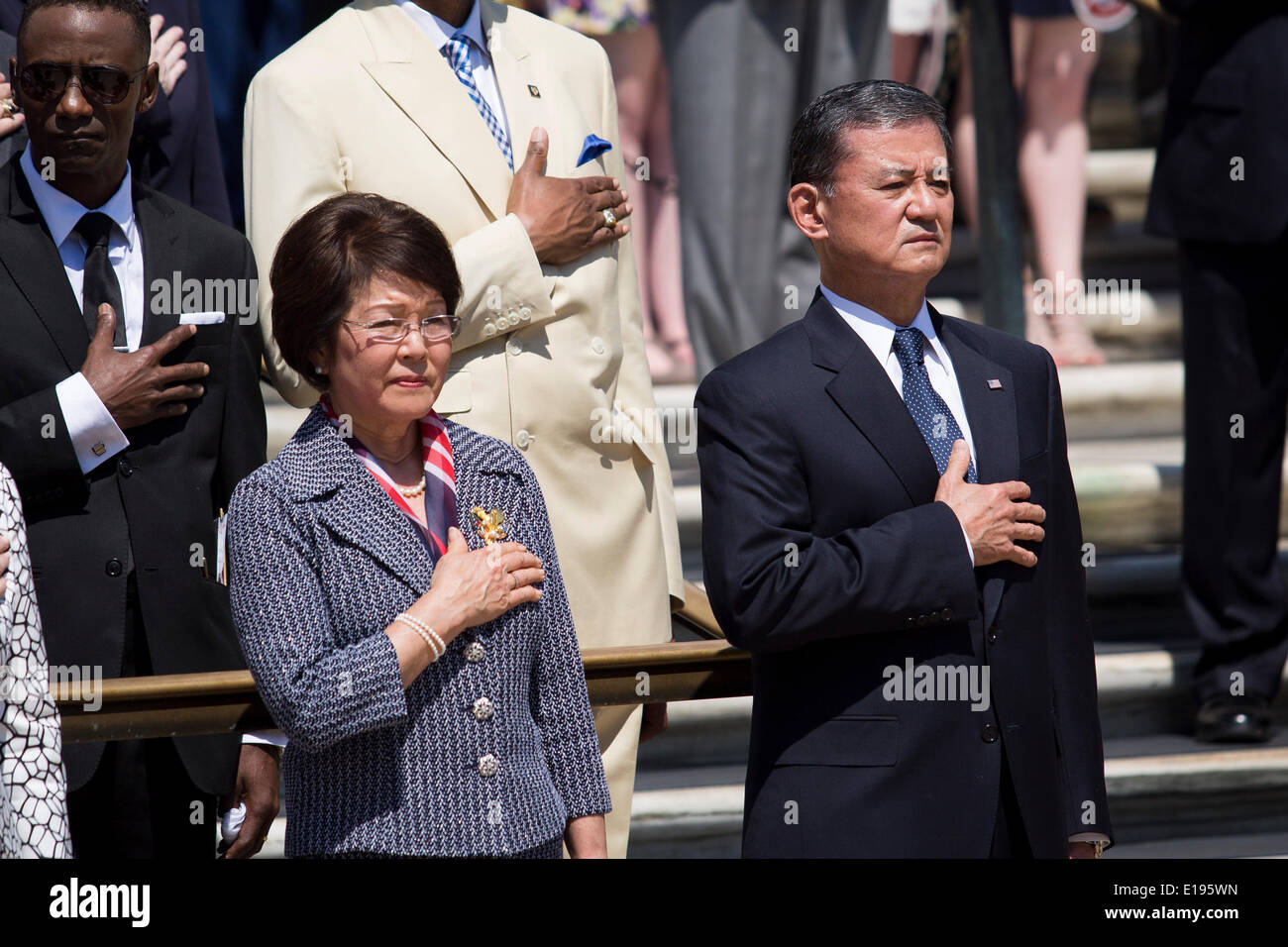 United States Secretary of Veterans Affairs Eric Shinseki (R) and his wife Patricia Shinseki (L) look on during as U.S. President Barack Obama attends a wreath laying ceremony at the Tomb of the Unknown Soldier at Arlington National Cemetery, May 26, 2014 in Arlington, Virginia. President Obama returned to Washington Monday morning after a surprise visit to Afghanistan to visit U.S. troops at Bagram Air Field. Credit: Drew Angerer / Pool via CNP Stock Photo