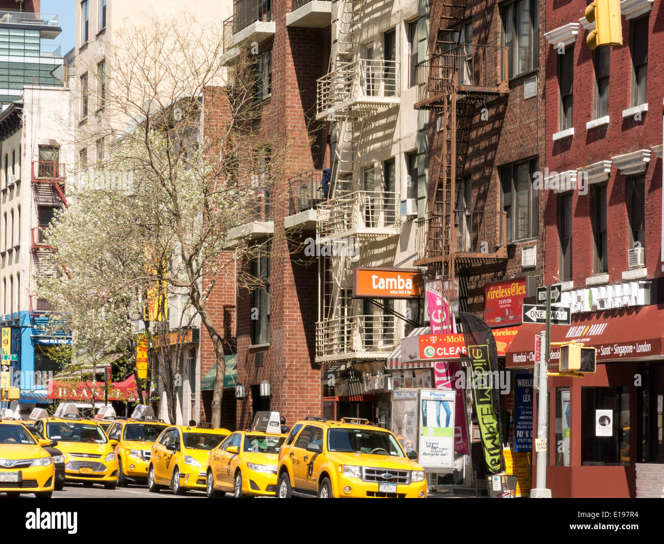 Taxis on Lexington Avenue ,Shop fronts, Indian businesses, Murray Hill, NYC Stock Photo