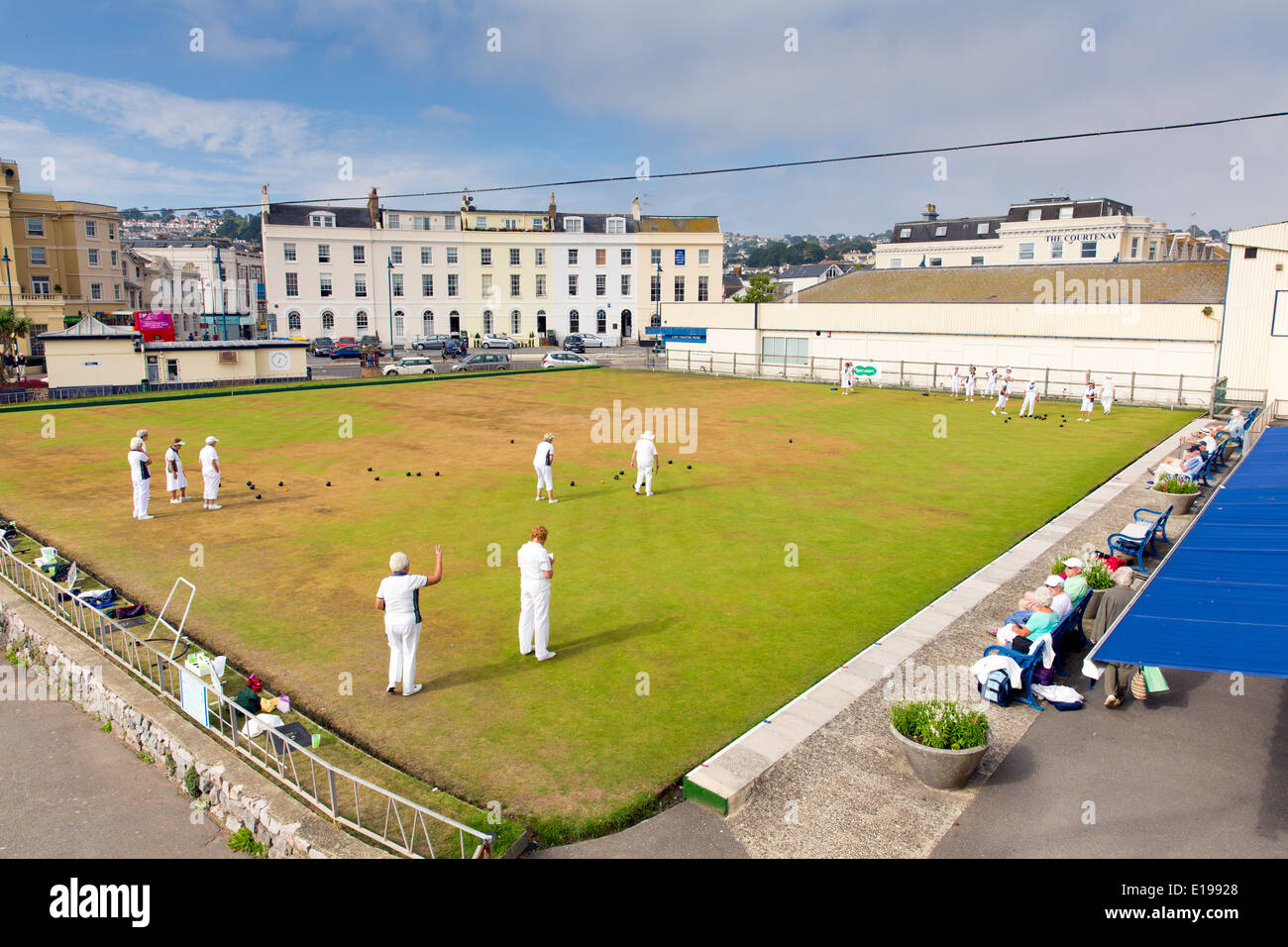 Bowls on bowling green Teignmouth Devon with players in white Stock Photo