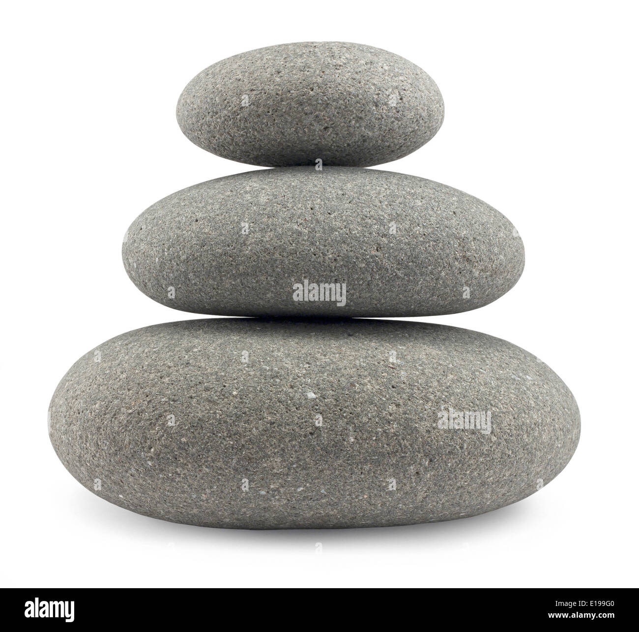 Rounded pebbles balancing in a uniform stack great concept for the perfect life balance Stock Photo