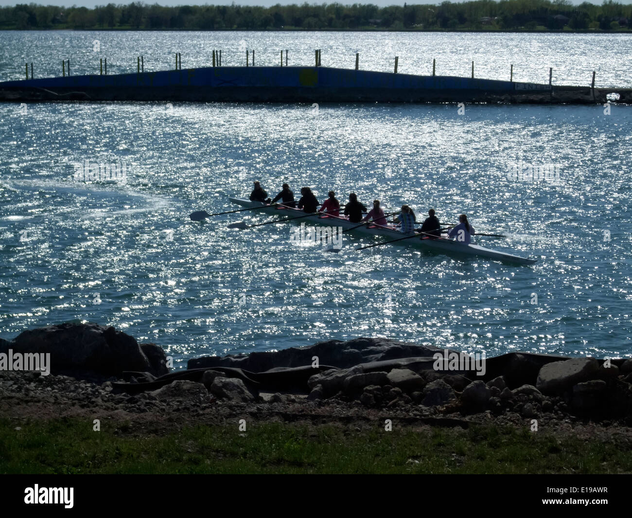 Tourists rowing a kayak in a lake Stock Photo Alamy