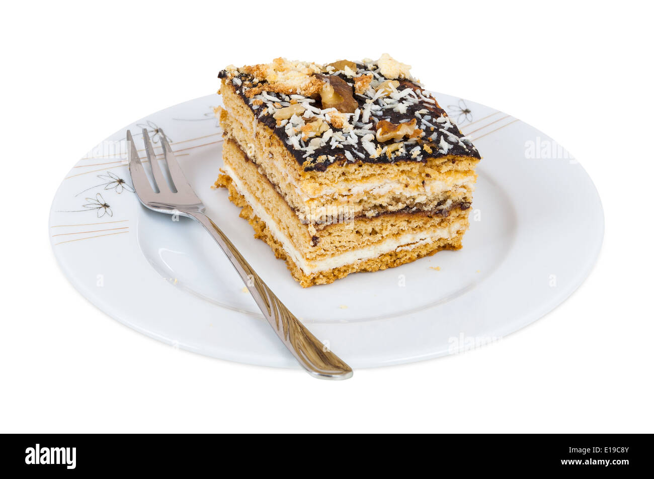 Honey cake with chocolate on a plate isolated on white background with clipping path Stock Photo
