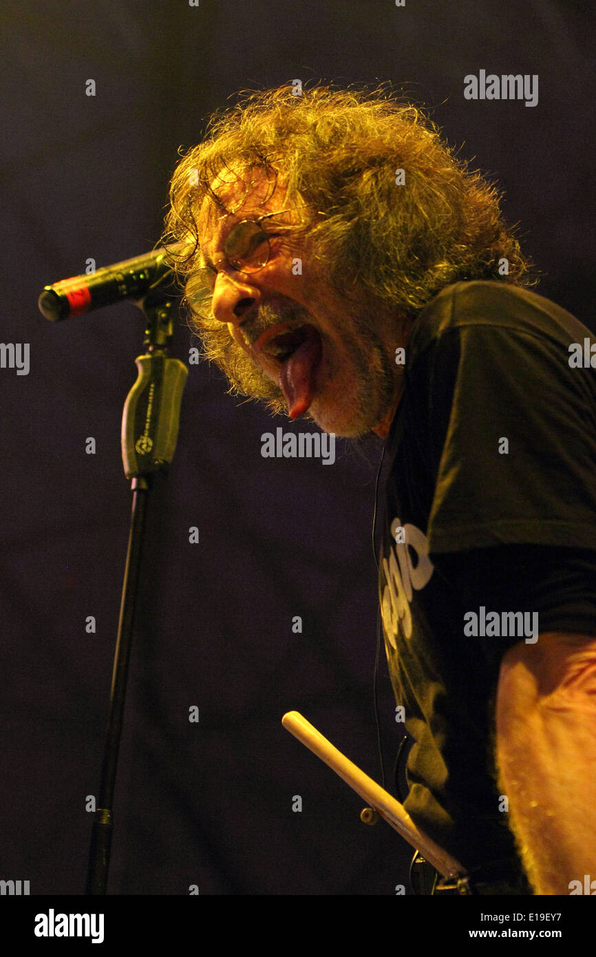Drummer and singer Franz Di Cioccio sticking out his tongue at 2011  concert of progressive rock band PFM Stock Photo