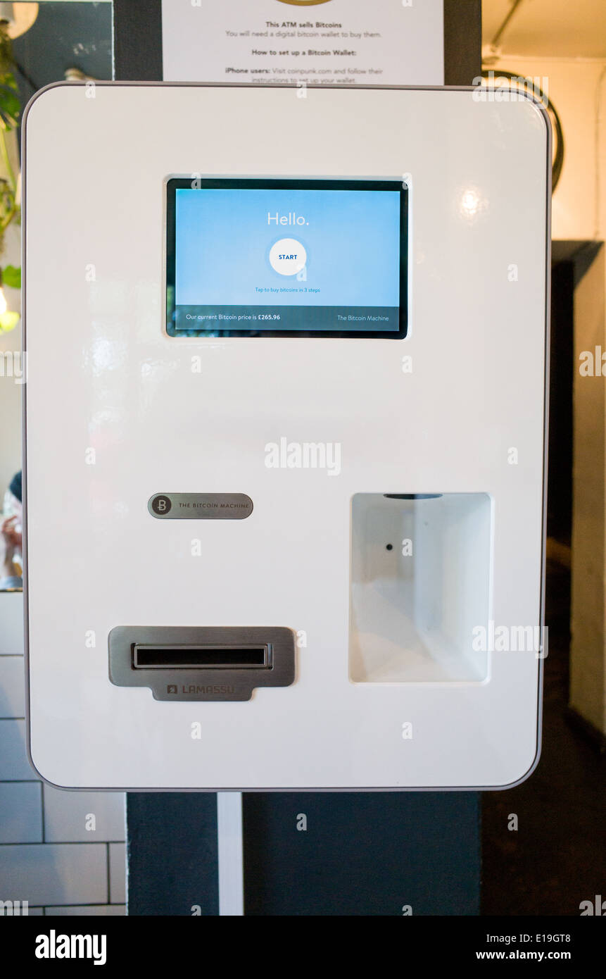 Bitcoin ATM machine at The Old Shoreditch Station cafe, London, England, UK Stock Photo