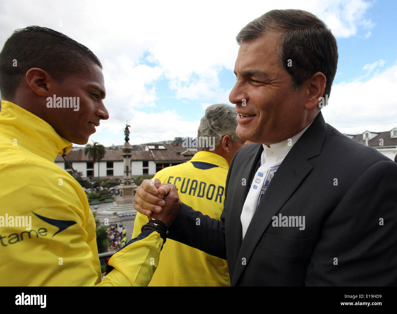 Quito. 28th May, 2014. Antonio Valencia (L) of Ecuador's national soccer team shakes hands with Ecuador's President Rafael Correa in the balcony of the Palace of Carondelet, in Quito, capital of Ecuador. Ecuador's national soccer team got farewell by its supporters in an act where President Rafael Correa delivered to the capitan Luis Antonio Valencia the Tricolor Flag as sign of support to the team by the Ecuatorian people, according to local press. © Santiago Armas/Xinhua/Alamy Live News Stock Photo
