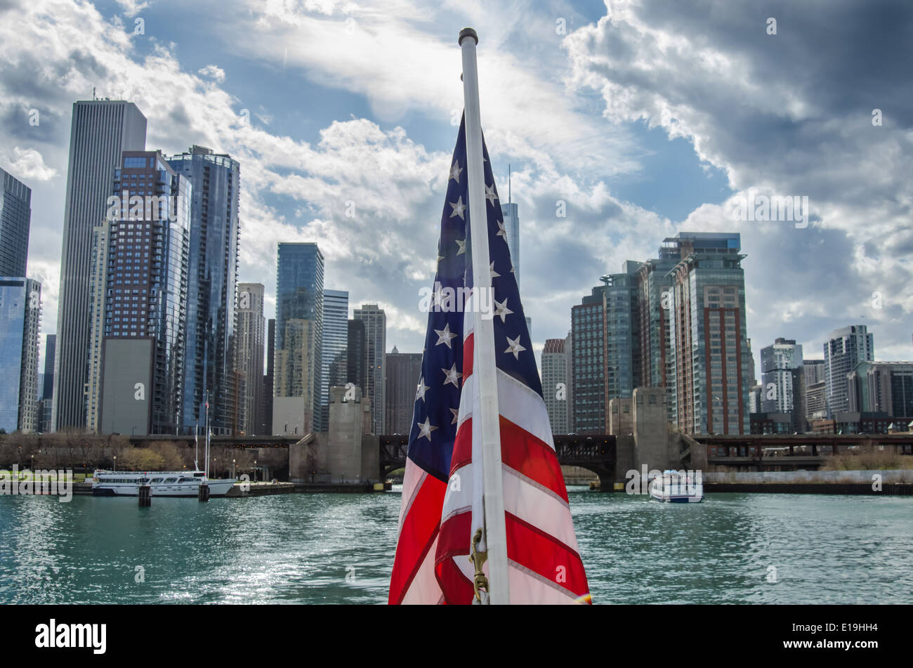 American Flag in Front of Downtown Chicago Skyline Stock Photo