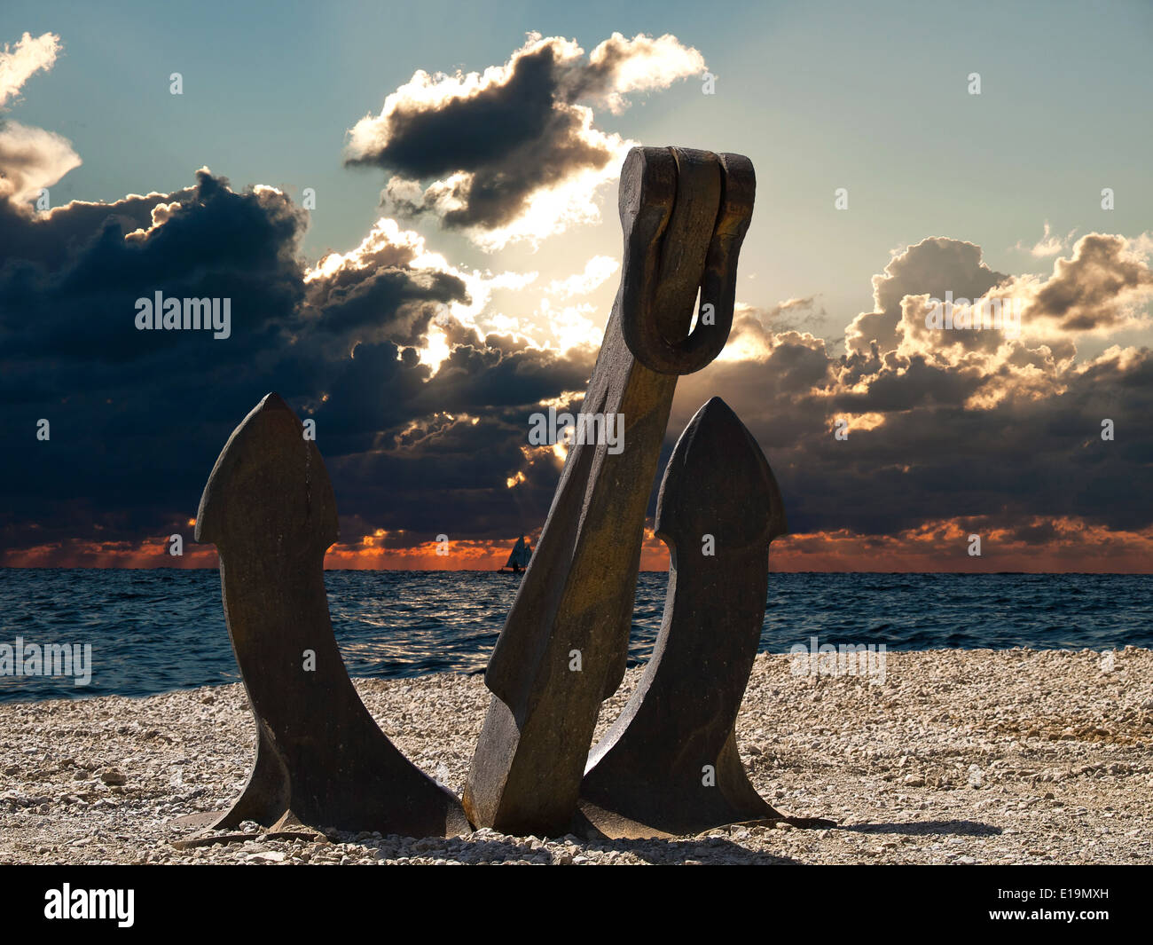 anchor in sunset with the boats on a sea Stock Photo - Alamy