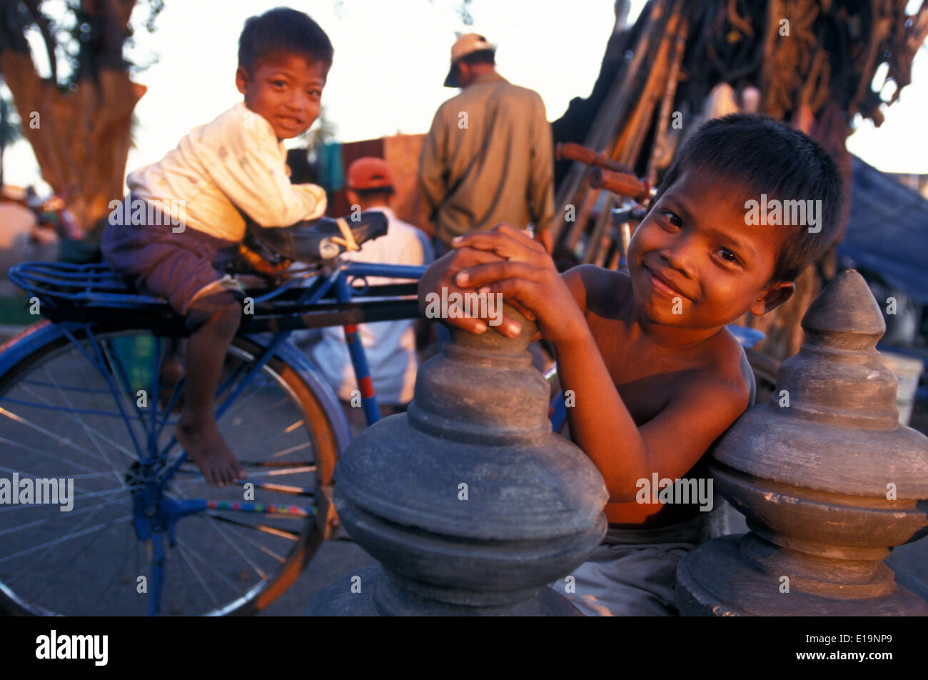 Cambodia children playing with toys,- two girls aged 8-10 years, Phnom  Penh, Cambodia, Asia Stock Photo - Alamy