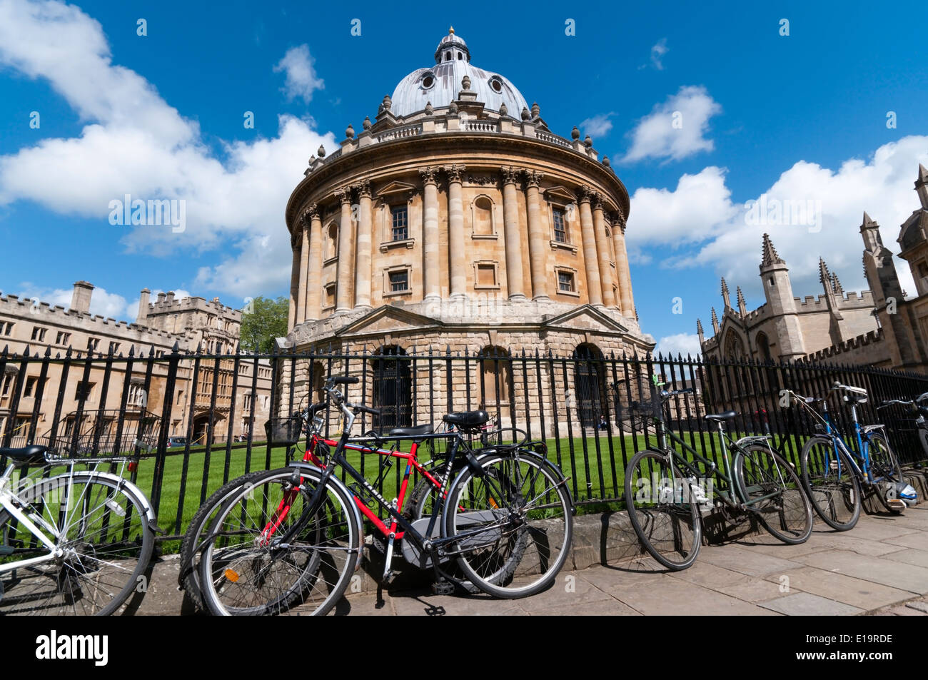 Bicycles chained and leaning against the railings around the Radcliffe Camera in Oxford. Stock Photo