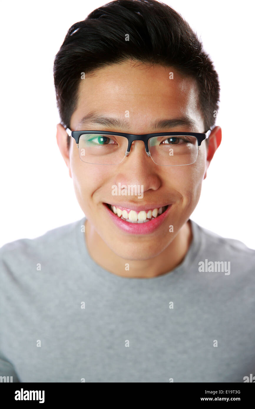 Closeup portrait of a happy asian man over white background Stock Photo