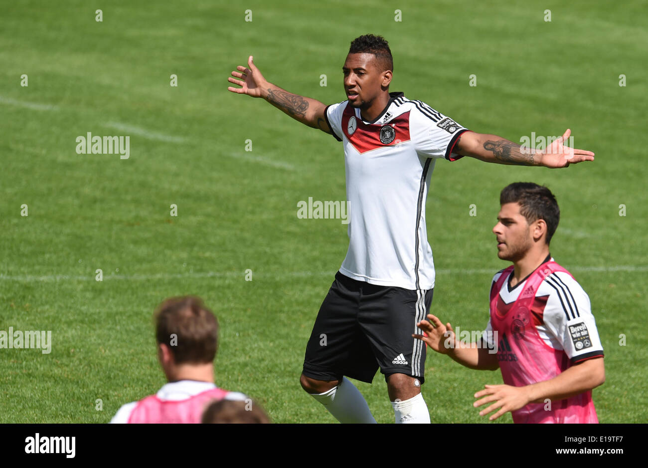 Passeier, Italy. 28th May, 2014. Jerome Boateng gestures during a training session on a training ground at St. Leonhard in Passeier, Italy, 28 May 2014. Germany's national soccer squad prepares for the upcoming FIFA World Cup 2014 in Brazil at a training camp in South Tyrol until 30 May 2014. Photo: ANDREAS GEBERT/DPA/Alamy Live News Stock Photo