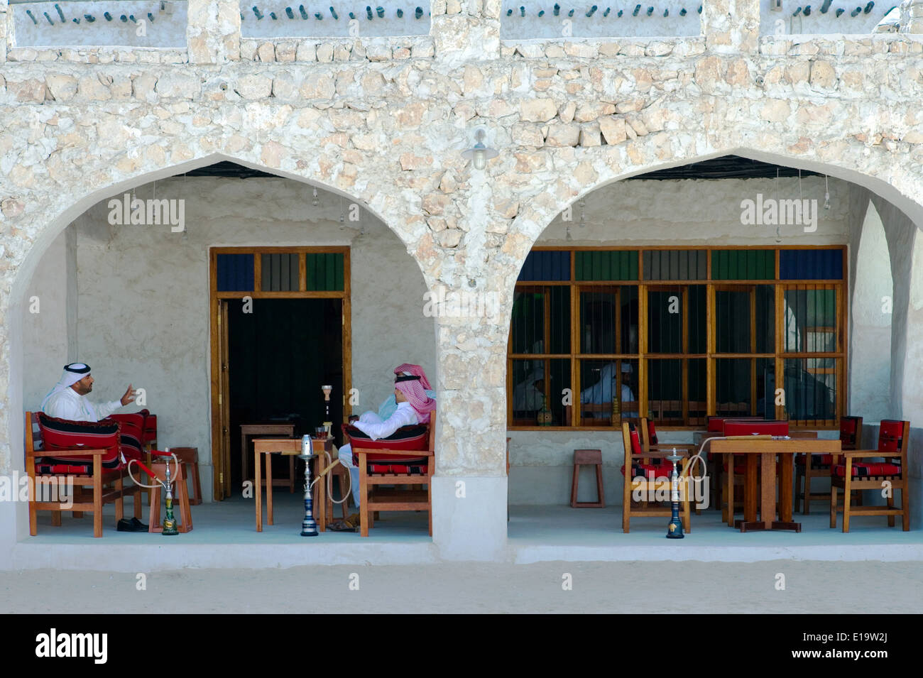 Qatar, Doha, local people in a coffee bar of the Souq Wakif in the old