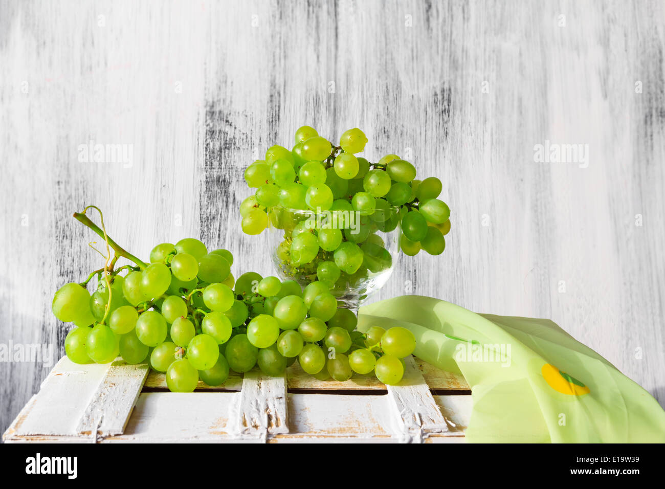 Still life with fruit and a bottle of wine grapes Stock Photo - Alamy