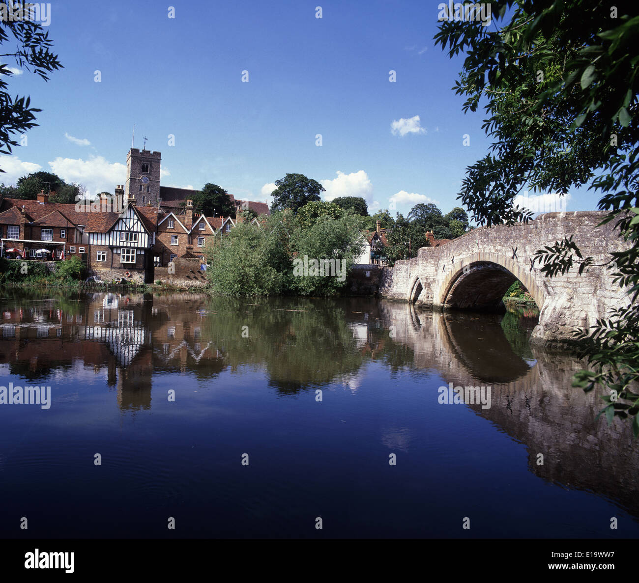Aylesford Kent with its stone bridge,church and riverside pub all reflected in the river Medway. Stock Photo