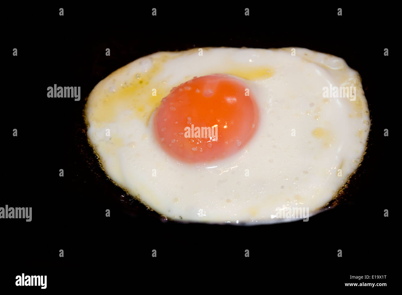 Fried egg with salt Stock Photo