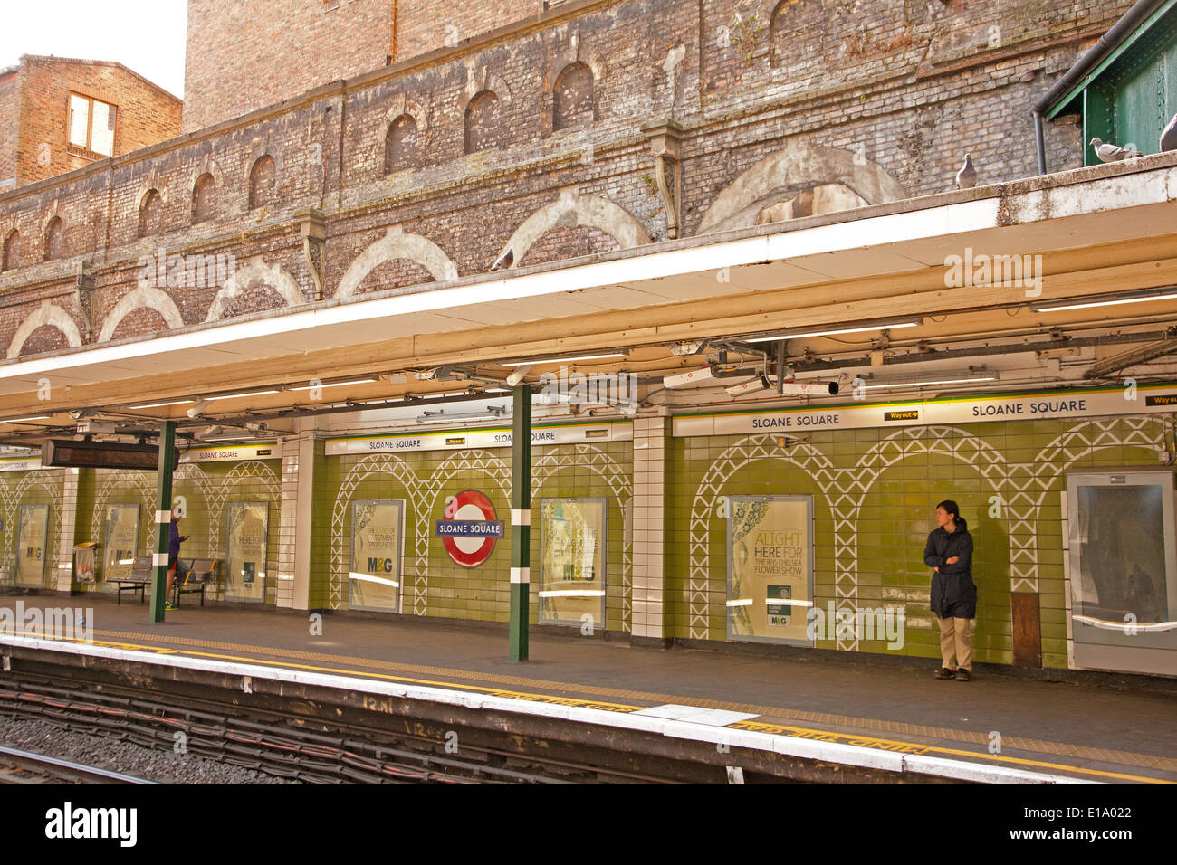 London, England, UK. Sloane Square Underground Station with people waiting for tube train Stock Photo