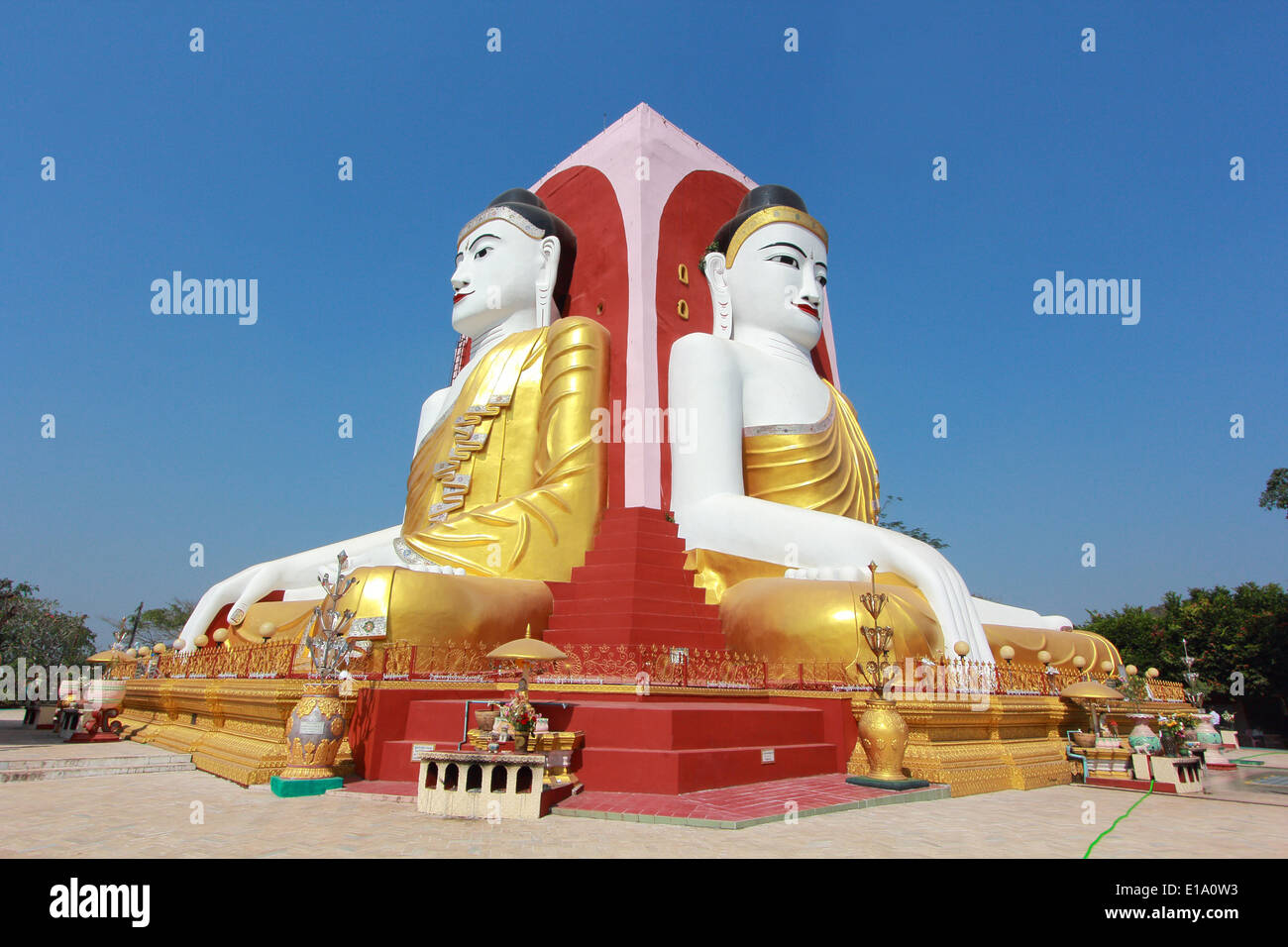 There are four buddha image sit 4 sideat Kyaik pun pagoda myanmar Stock Photo