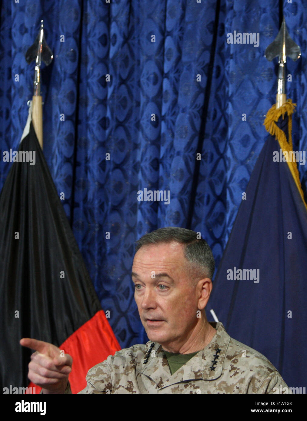 Kabul, Afghanistan. 28th May, 2014. Top U.S. Commander in Afghanistan General Joseph F. Dunford, Jr. attends a press conference in Kabul, Afghanistan, May 28, 2014. Joseph F. Dunford, Jr. on Wednesday reaffirmed his country's commitment to Afghans. Credit:  Ahmad Massoud/Xinhua/Alamy Live News Stock Photo