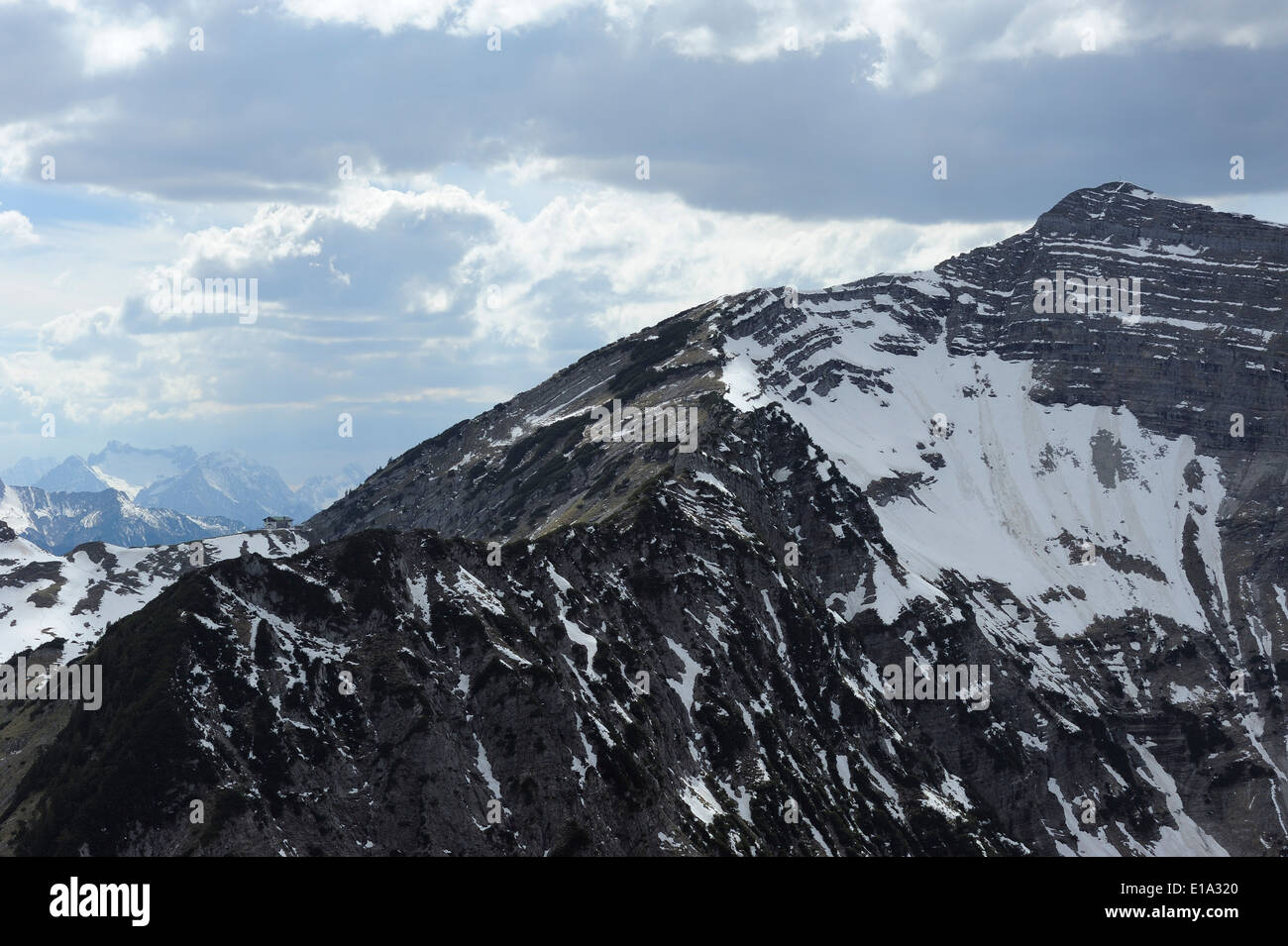 mountain lodge Toelzer Huette and steep wall of Schafreiter or Schafreuter in Karwendel region Stock Photo