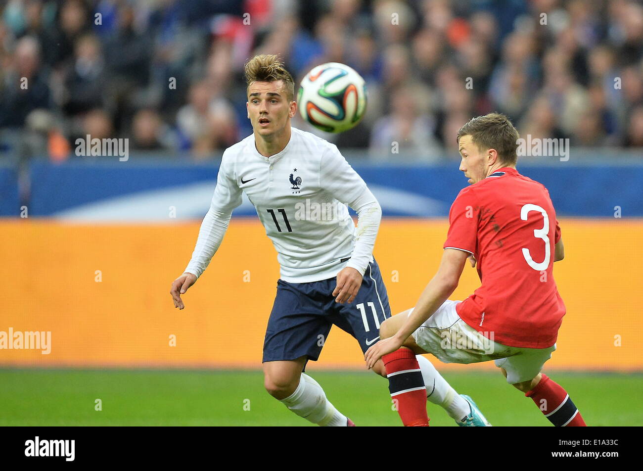 Paris, France. 27th May, 2014. International football friendly, France versus Norway from Stade de France. Antoine Griezmann (FRA) controls a ball in front of Martin Linnes (NOR) © Action Plus Sports/Alamy Live News Stock Photo