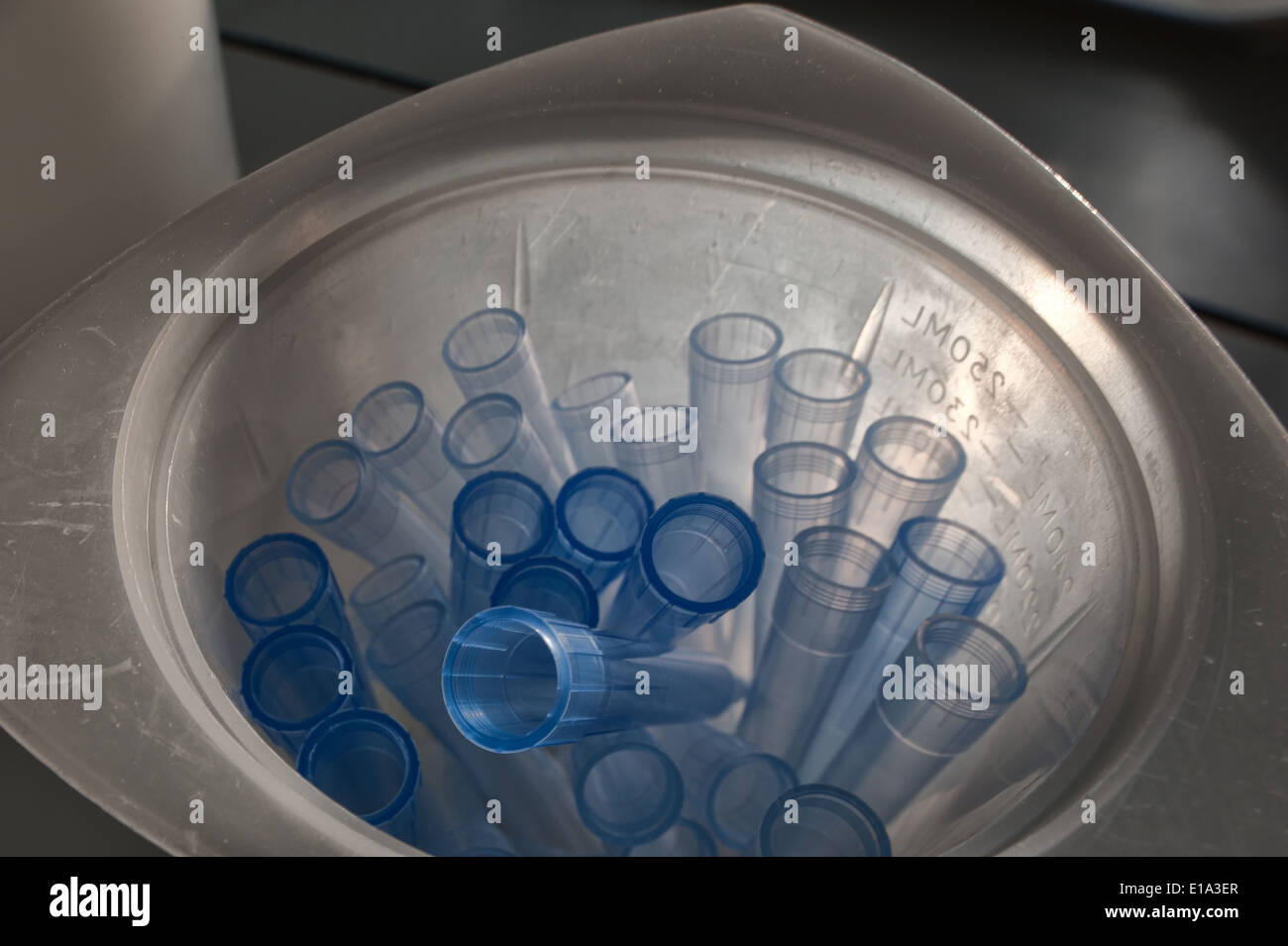 plastic container holding empty vials small flasks ready for medical testing and DNA protein