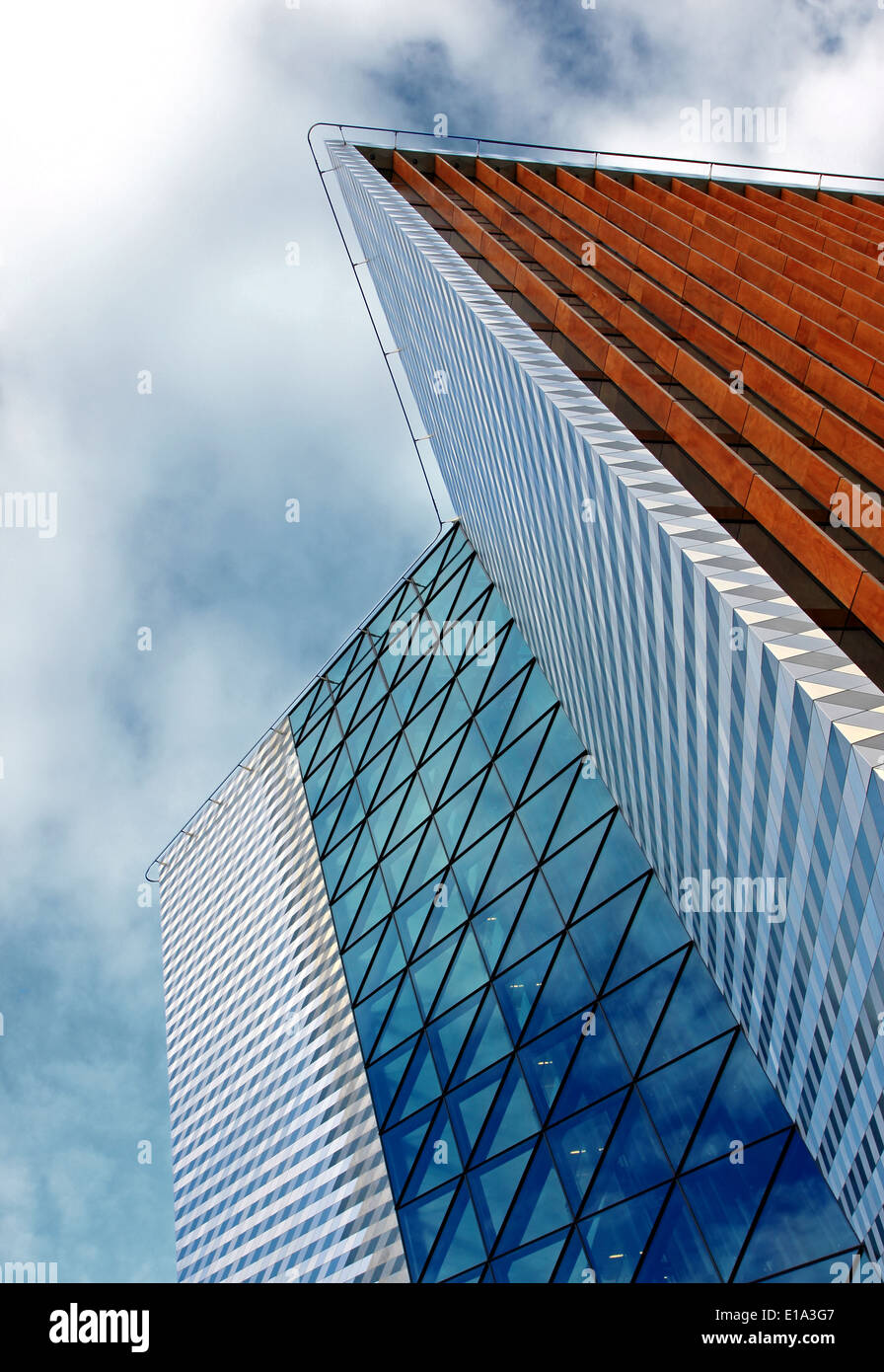 Modern office building under blue sky with clouds Stock Photo - Alamy