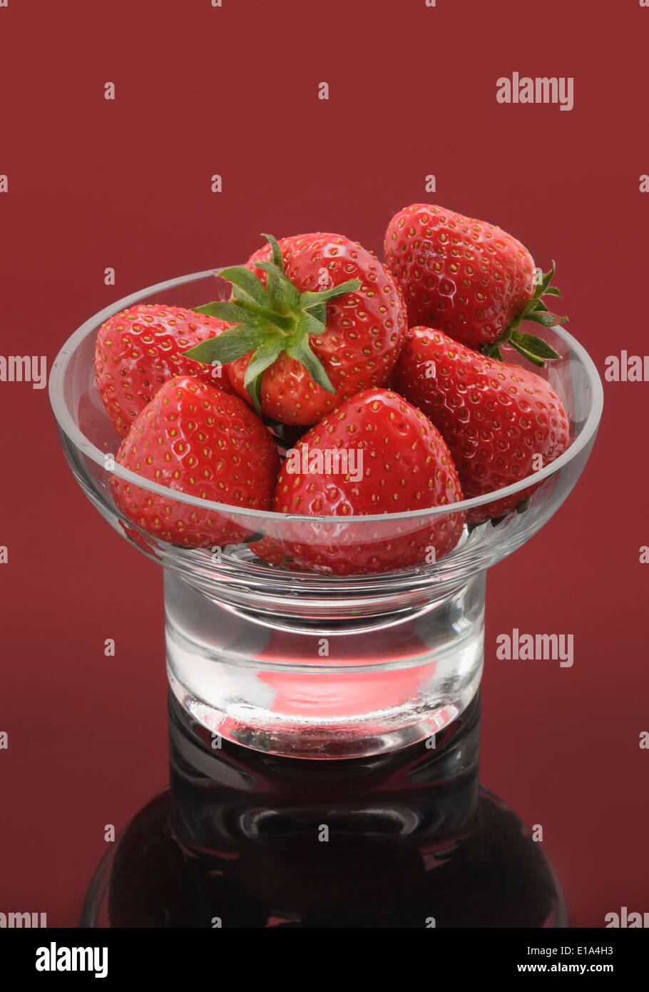 Glass Bowl with fresh Strawberries Stock Photo