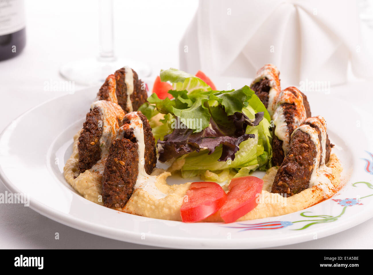 Fried half cut falafel patties of finely ground garbanzo beans spiced