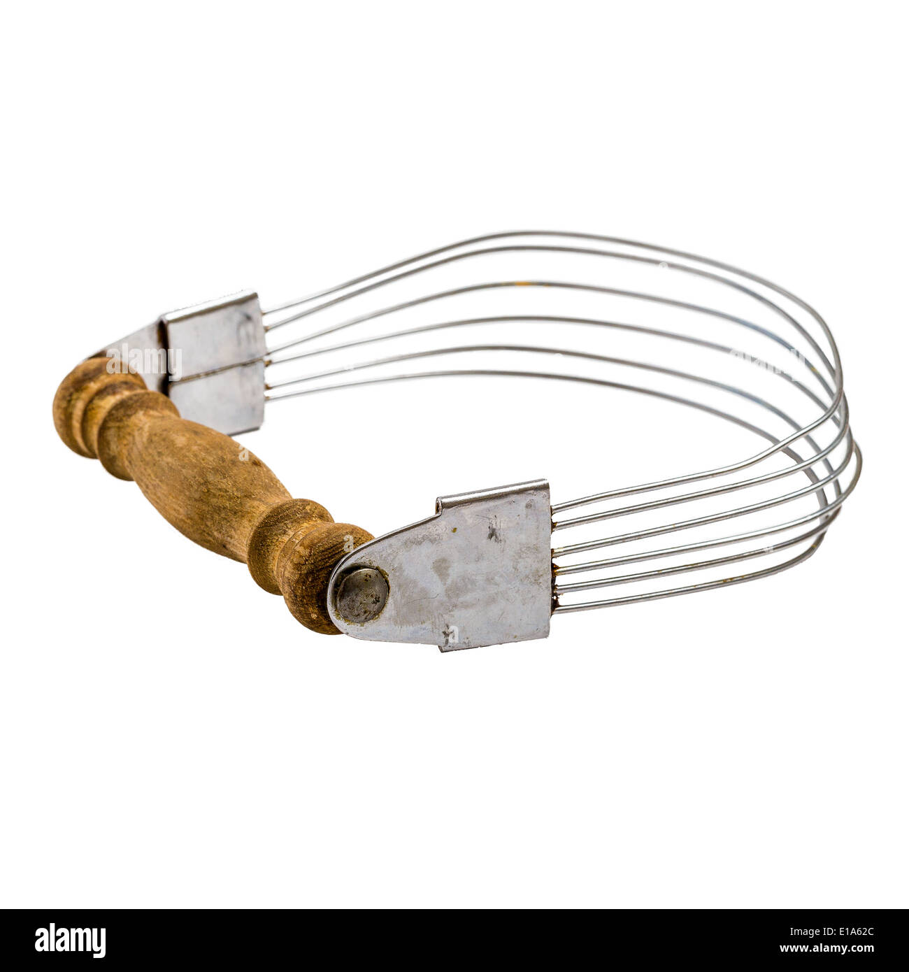 Antique pastry blender with a natural wooden handle on a solid white