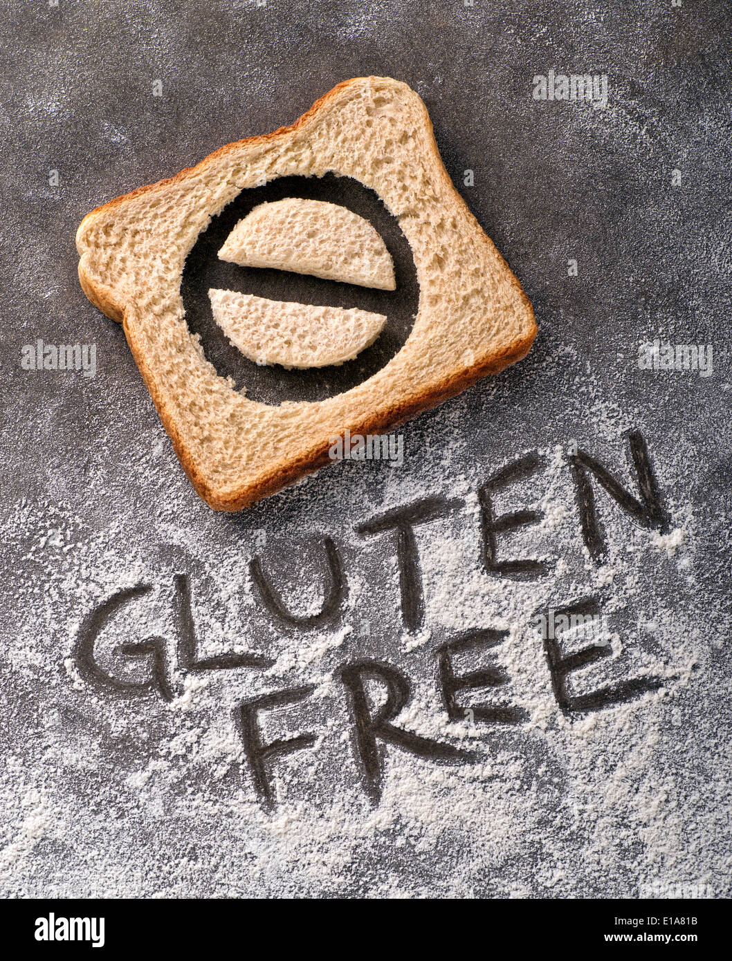 Gluten free bread with symbol and caption written in flour. Stock Photo