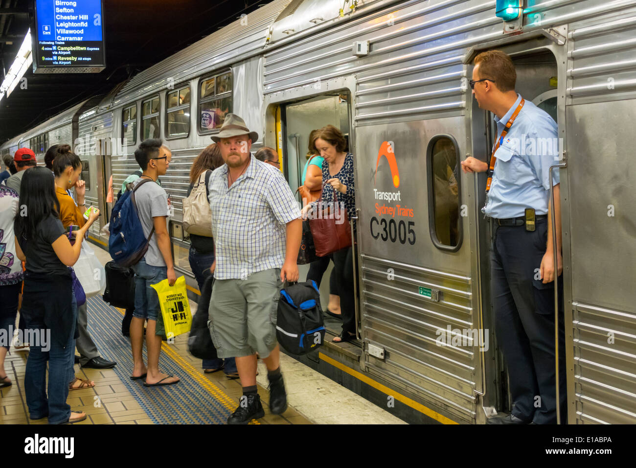 Sydney Australia,Town Hall Station,Sydney Trains,platform,riders,conductor,man men male,AU140312054 Stock Photo