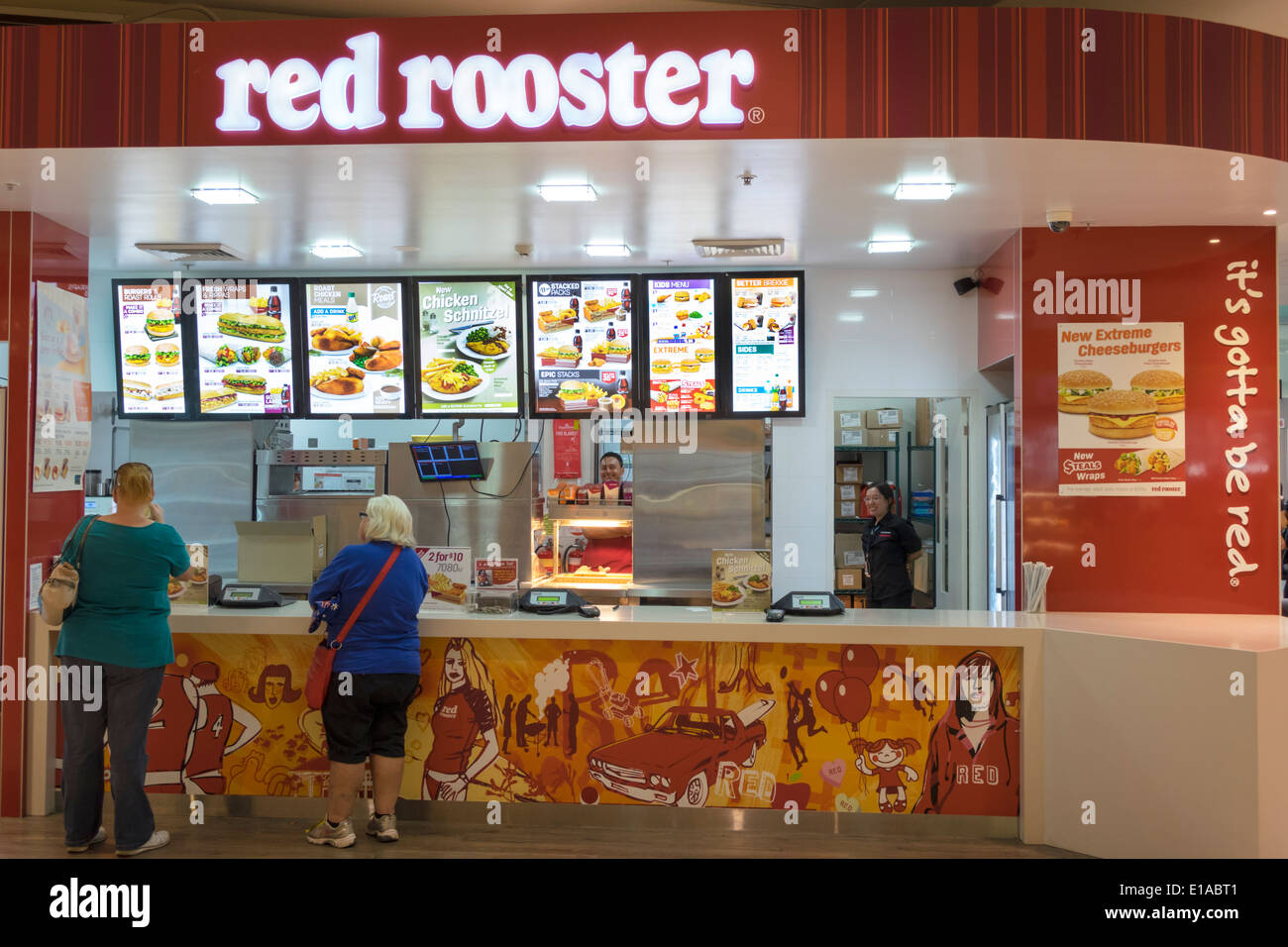 Sydney Australia,Kingsford-Smith Airport,SYD,terminal,front,Red Rooster,fast food,counter,restaurant restaurants food dining cafe cafes,woman female w Stock Photo