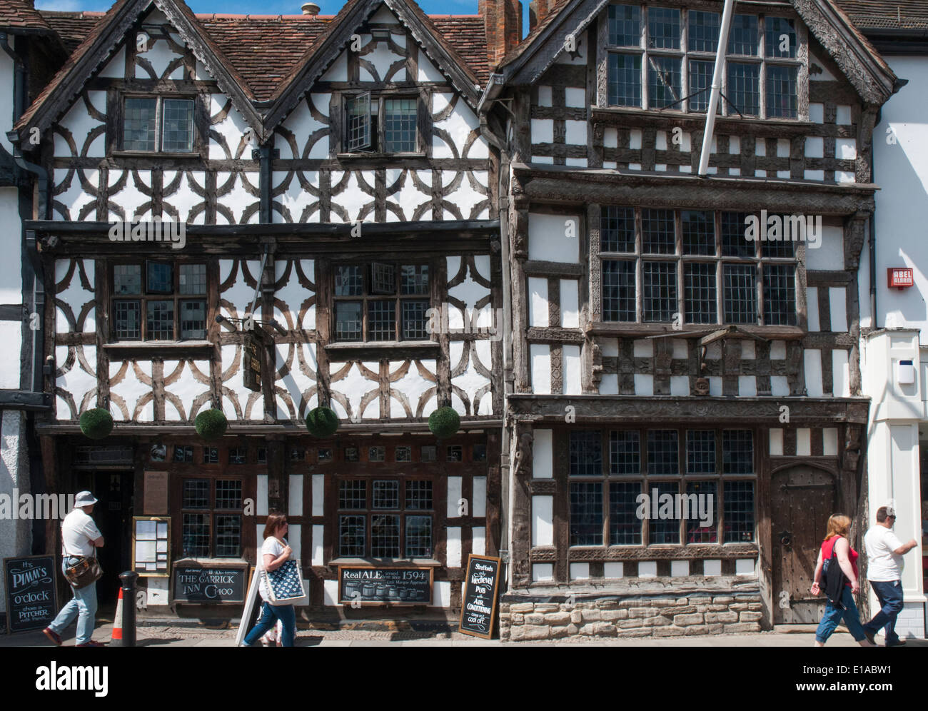 Tudor-style half-timbered shops (stores) in Stratford-upon-Avon, England Stock Photo