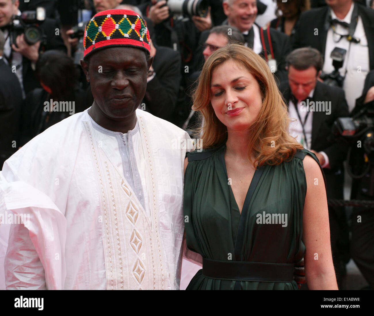 Moussa Toure and Maria Bonnevie at the the Grace of Monaco gala screening and opening ceremony red carpet at the 67th Cannes Stock Photo