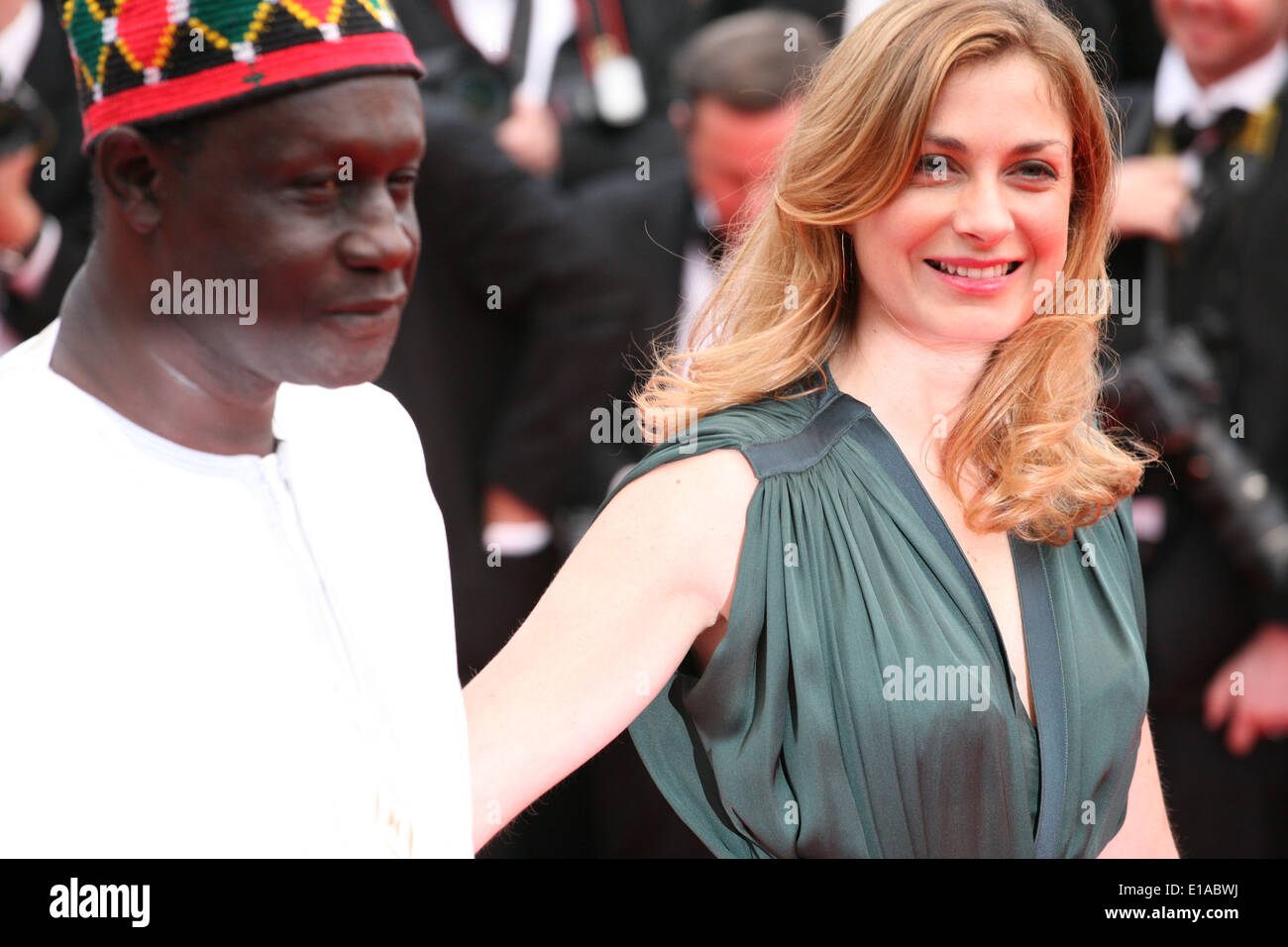 Moussa Toure and Maria Bonnevie at the the Grace of Monaco gala screening and opening ceremony red carpet at the 67th Cannes Fil Stock Photo