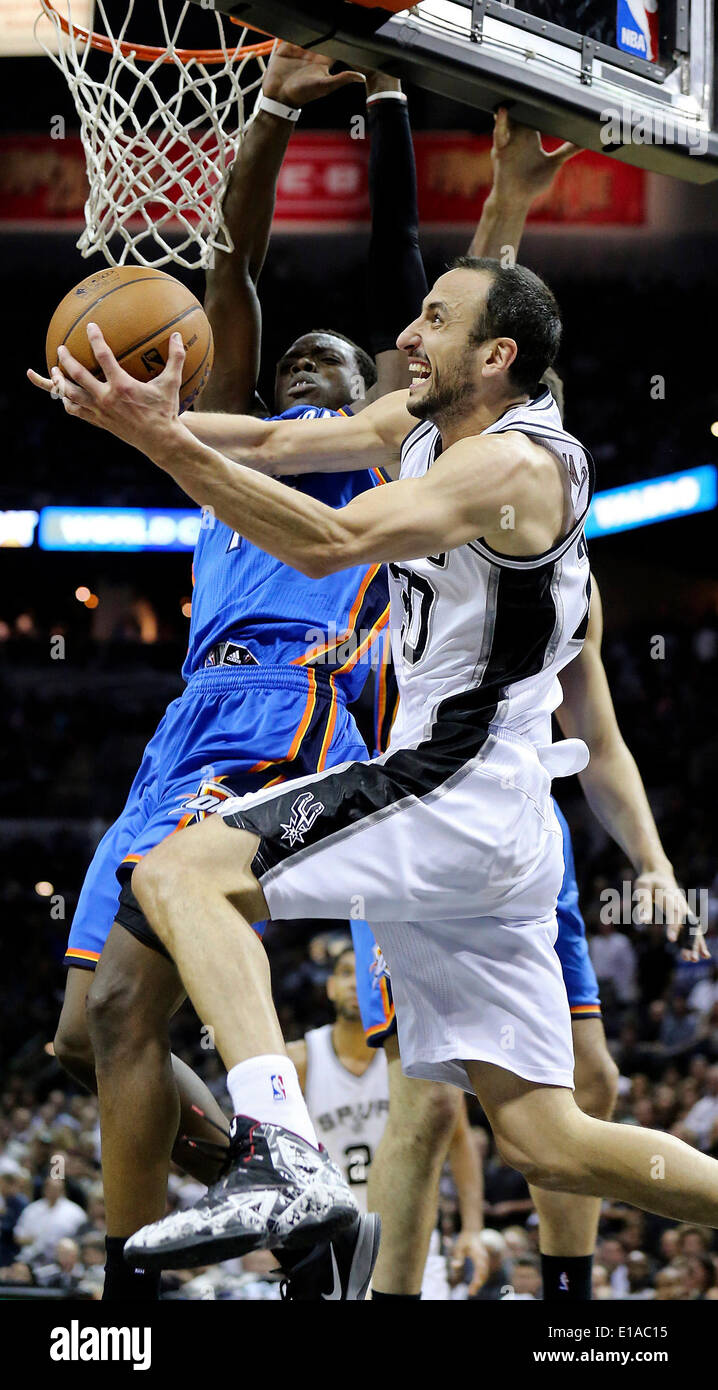 May 21, 2014 - San Antonio, TEXAS, USA - San Antonio Spurs' Manu Ginobili looks for room around Oklahoma City Thunder's Reggie Jackson during second half action of Game 2 in the Western Conference Finals Wednesday May 21, 2014 at the AT&T Center. The Spurs won 112-77. (Credit Image: © San Antonio Express-News/ZUMAPRESS.com) Stock Photo