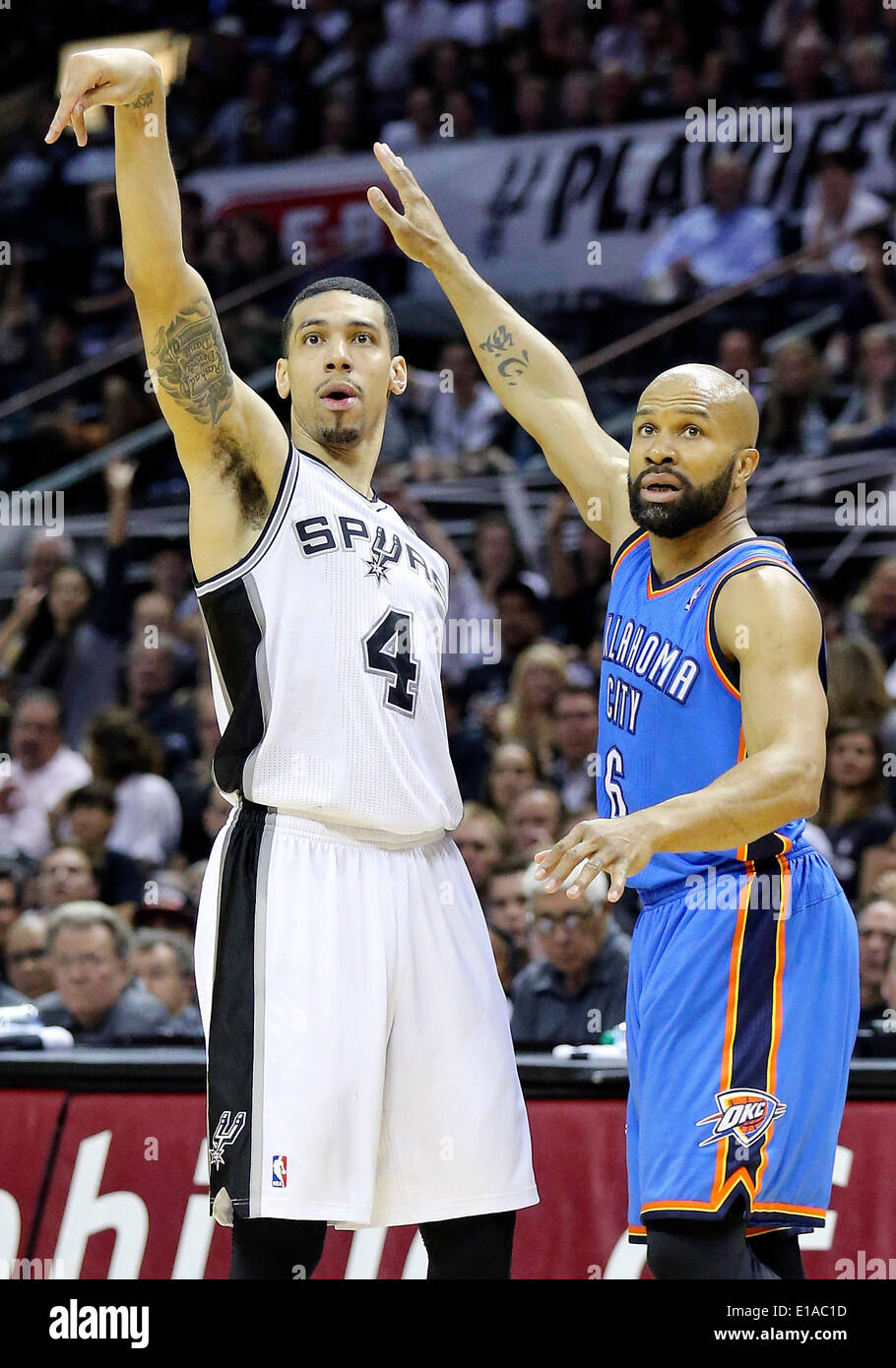 May 21, 2014 - San Antonio, TEXAS, USA - San Antonio Spurs' Danny Green watches his 3 pointer as Oklahoma City Thunder's Derek Fisher looks on during second half action of Game 2 in the Western Conference Finals Wednesday May 21, 2014 at the AT&T Center. The Spurs won 112-77. (Credit Image: © San Antonio Express-News/ZUMAPRESS.com) Stock Photo