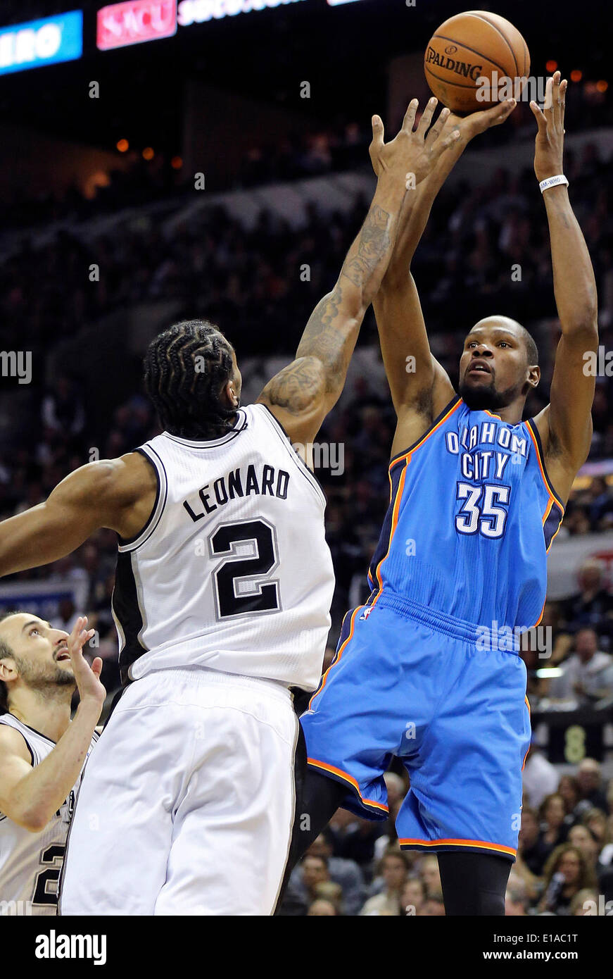 May 21, 2014 - San Antonio, TEXAS, USA - Oklahoma City Thunder's Kevin Durant shoots over San Antonio Spurs' Manu Ginobili and Kawhi Leonard during first half action of Game 2 in the Western Conference Finals Wednesday May 21, 2014 at the AT&T Center. (Credit Image: © San Antonio Express-News/ZUMAPRESS.com) Stock Photo