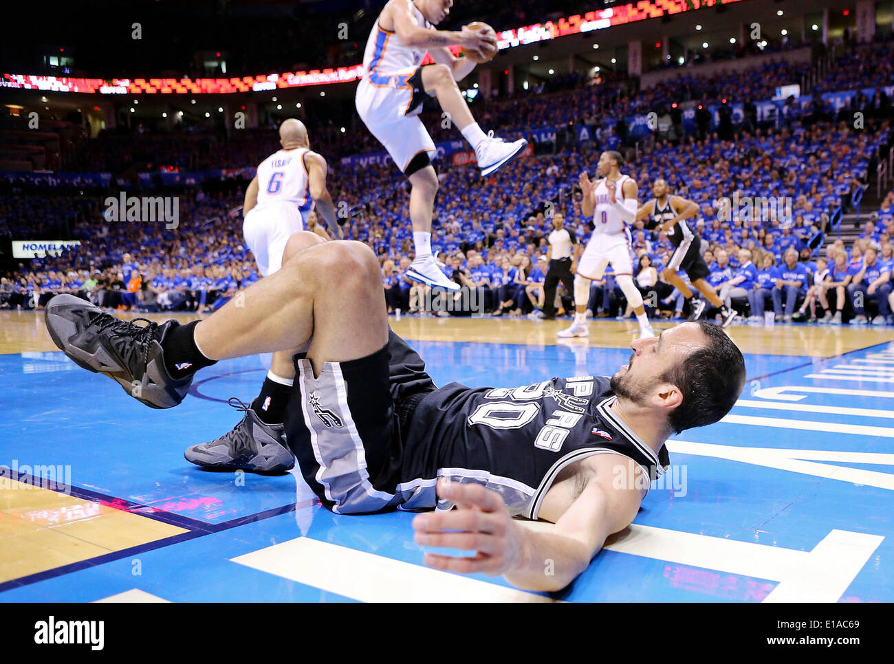 May 25, 2014 - Oklahoma City, OKLAHOMA, USA - San Antonio Spurs' Manu Ginobili lies on the floor after a play during second half action in Game 3 of the Western Conference Finals against the Oklahoma City Thunder Sunday May 25, 2014 at Chesapeake Energy Arena in Oklahoma City, OK. The Thunder won 106-97. (Credit Image: © San Antonio Express-News/ZUMAPRESS.com) Stock Photo