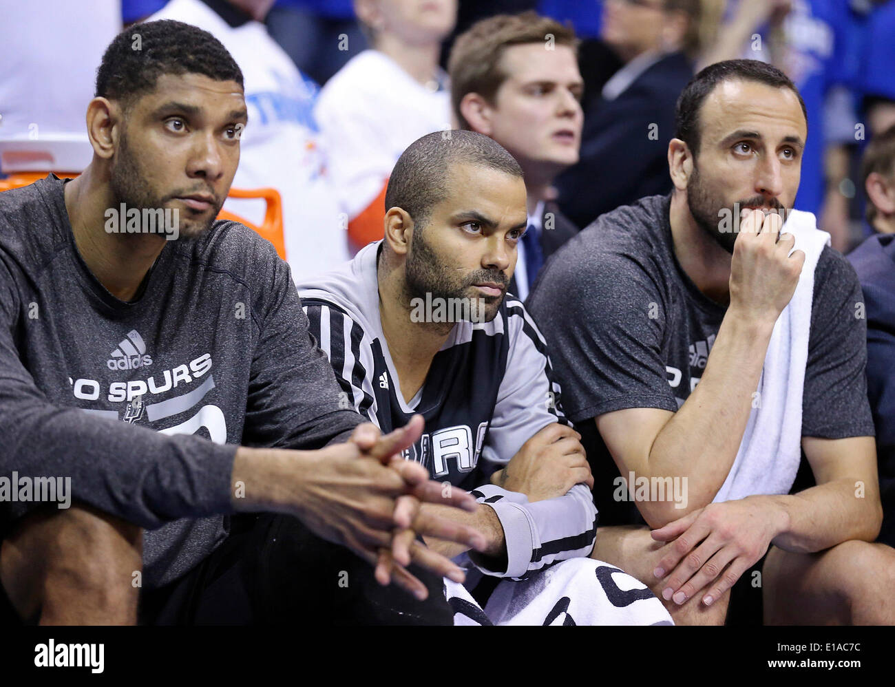 May 27, 2014 - Oklahoma City, OKLAHOMA, USA - San Antonio Spurs' Tim Duncan (from left), Tony Parker, and Manu Ginobili watch second half action in Game 4 of the Western Conference Finals against the Oklahoma City Thunder Tuesday May 27, 2014 at Chesapeake Energy Arena in Oklahoma City, OK. The Thunder won 105-92. (Credit Image: © San Antonio Express-News/ZUMAPRESS.com) Stock Photo