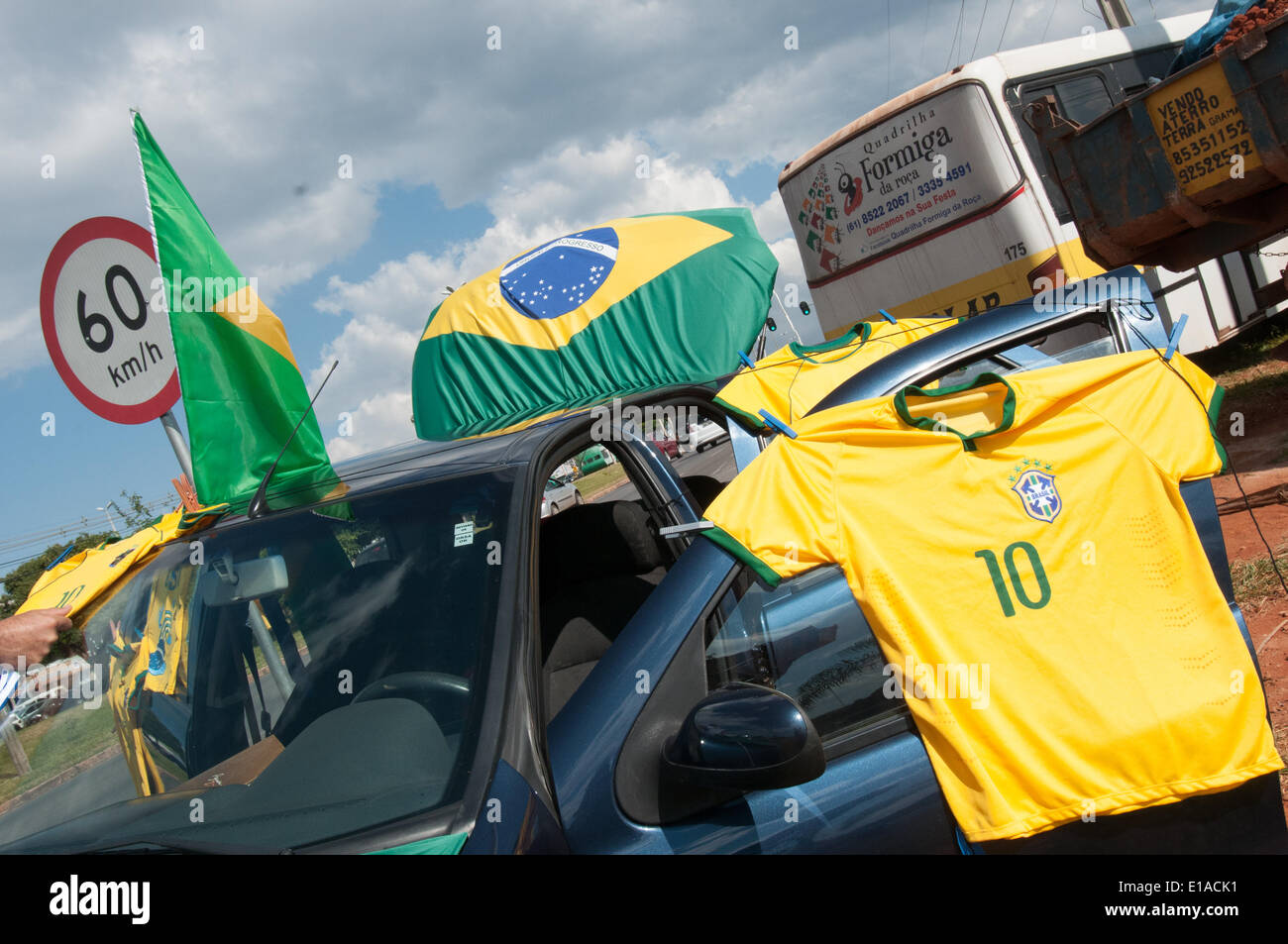 In anticipation of the June World Cup : Brazilians in Brasilia are decorating their shops, selling merchandise with the colors of Brazil and collecting cards with the teams participating in the soccer games Stock Photo