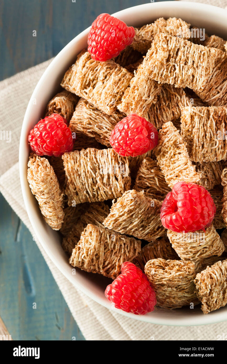 Healthy Whole Wheat Shredded Cereal with Fruit for Breakfast Stock