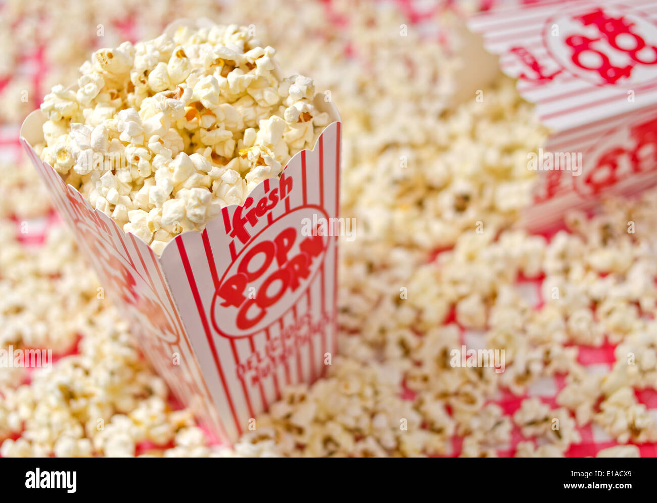 Freshly popped popcorn against a popcorn background Stock Photo Alamy