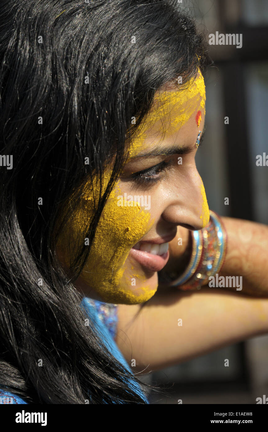 A beautiful Indian bride during a pithi or vidhi ceremony prior to the ...