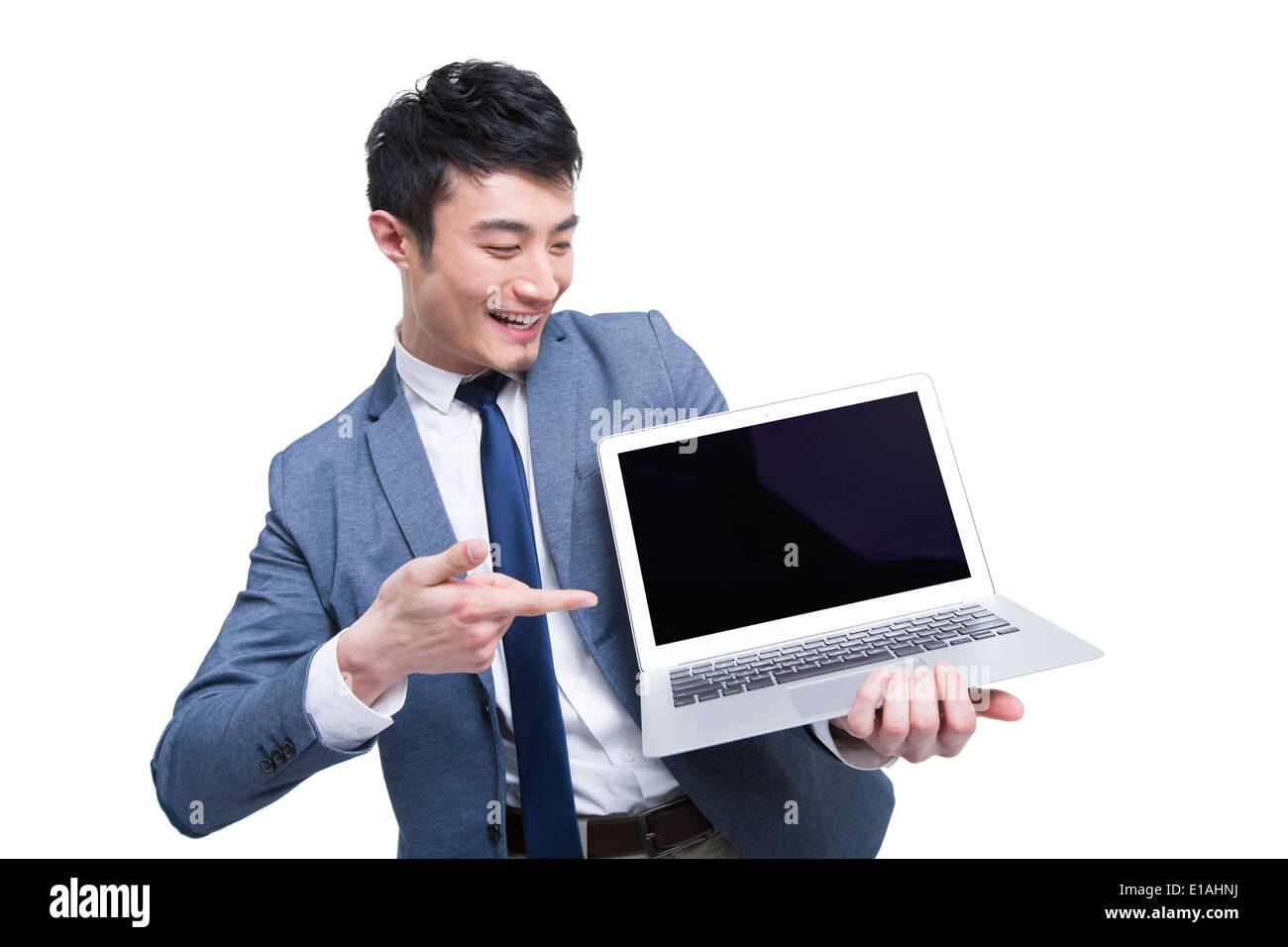 Young businessman with laptop Stock Photo