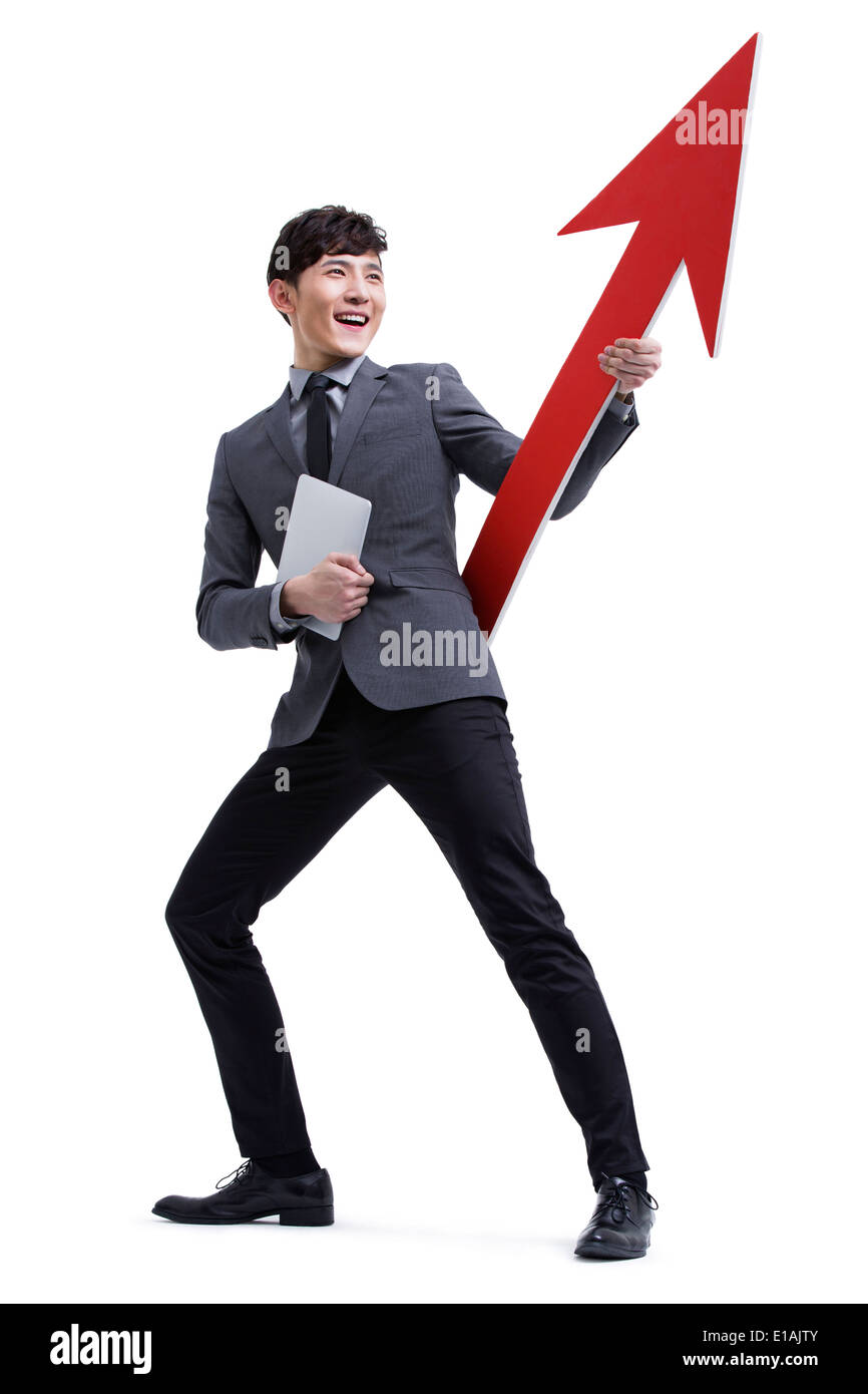 Fashionable businessman with red arrow sign Stock Photo - Alamy
