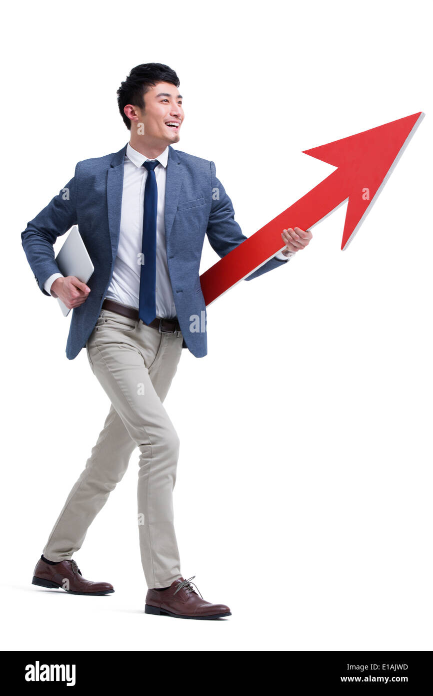 Fashionable businessman with red arrow sign Stock Photo - Alamy